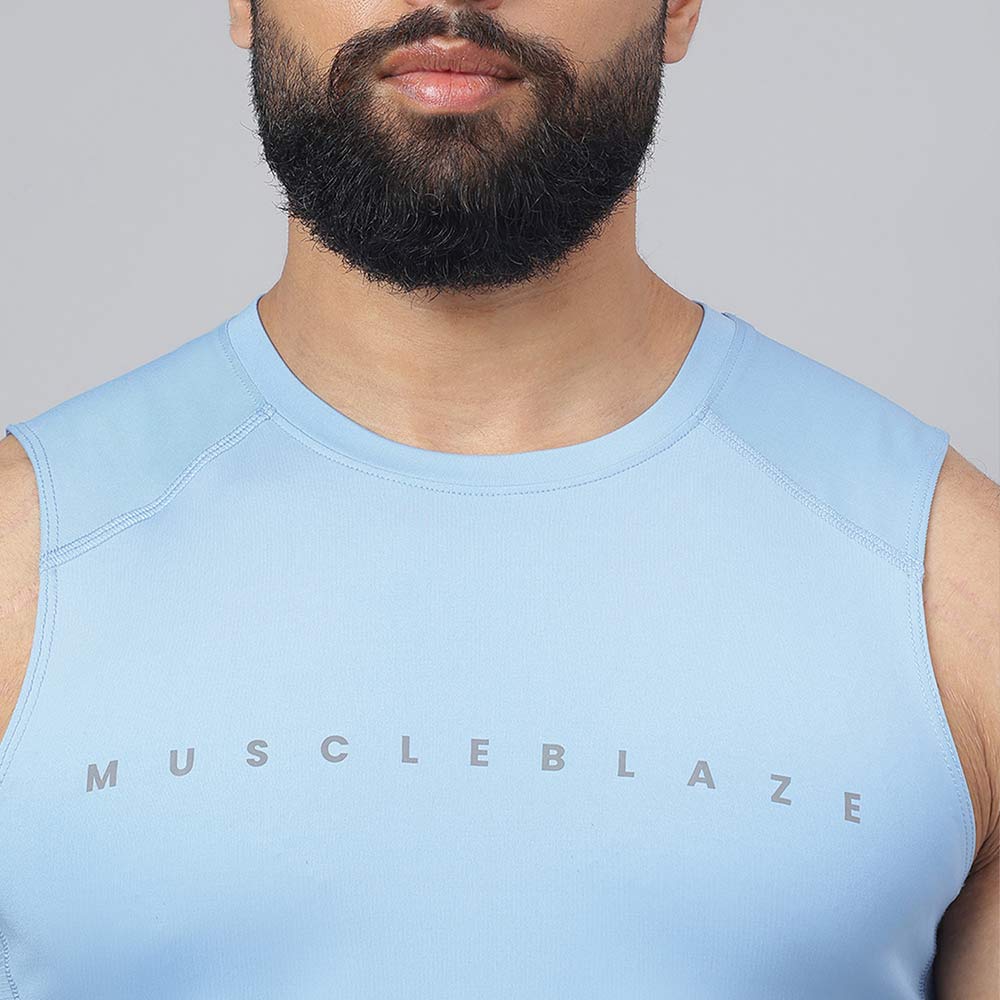 7 - MuscleBlaze Air Tech Compression MuscleTank,  Dusk Blue  Small