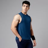 https://img8.hkrtcdn.com/33105/prd_3310427-MuscleBlaze-Delt-Tank-Teal-Blue-Medium_o.jpg
