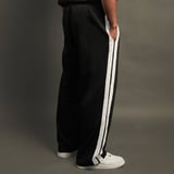 https://img8.hkrtcdn.com/40807/prd_4080677-MuscleBlaze-Straight-Fit-Panel-Trackpants-Black-XLarge_o.jpg