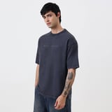 https://img8.hkrtcdn.com/43341/prd_4334097-MuscleBlaze-Natty-But-Tasty-Oversized-Washed-TShirt-Medium-Light-Grey_o.jpg