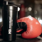 7 - MuscleBlaze Steel Pro Shaker,  Black  750 ml