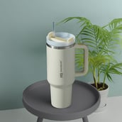 4 - MuscleBlaze Stainless Steel Insulated Tumbler,  Stallion White  1.2 L